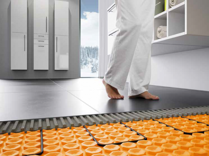 Elektriskās siltās grīdas paklājs DITRA-HEAT zem flīžu vai dabīgā akmens, elastīgiem vai tekstila segumiem un lamināta vai daudzslāņu parketa segumiem.